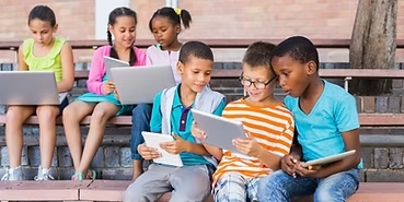six children looking at their own ipad happy